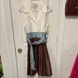 Elegant Sleeveless Midi Dress with Sash